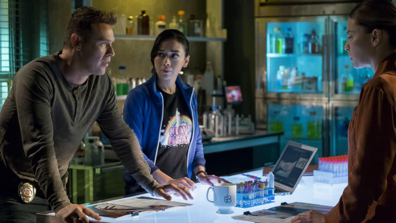 Dan (Kevin Alejandro), Ella (Aimee Garcia), and Chloe (Lauren German) in the crime lab.